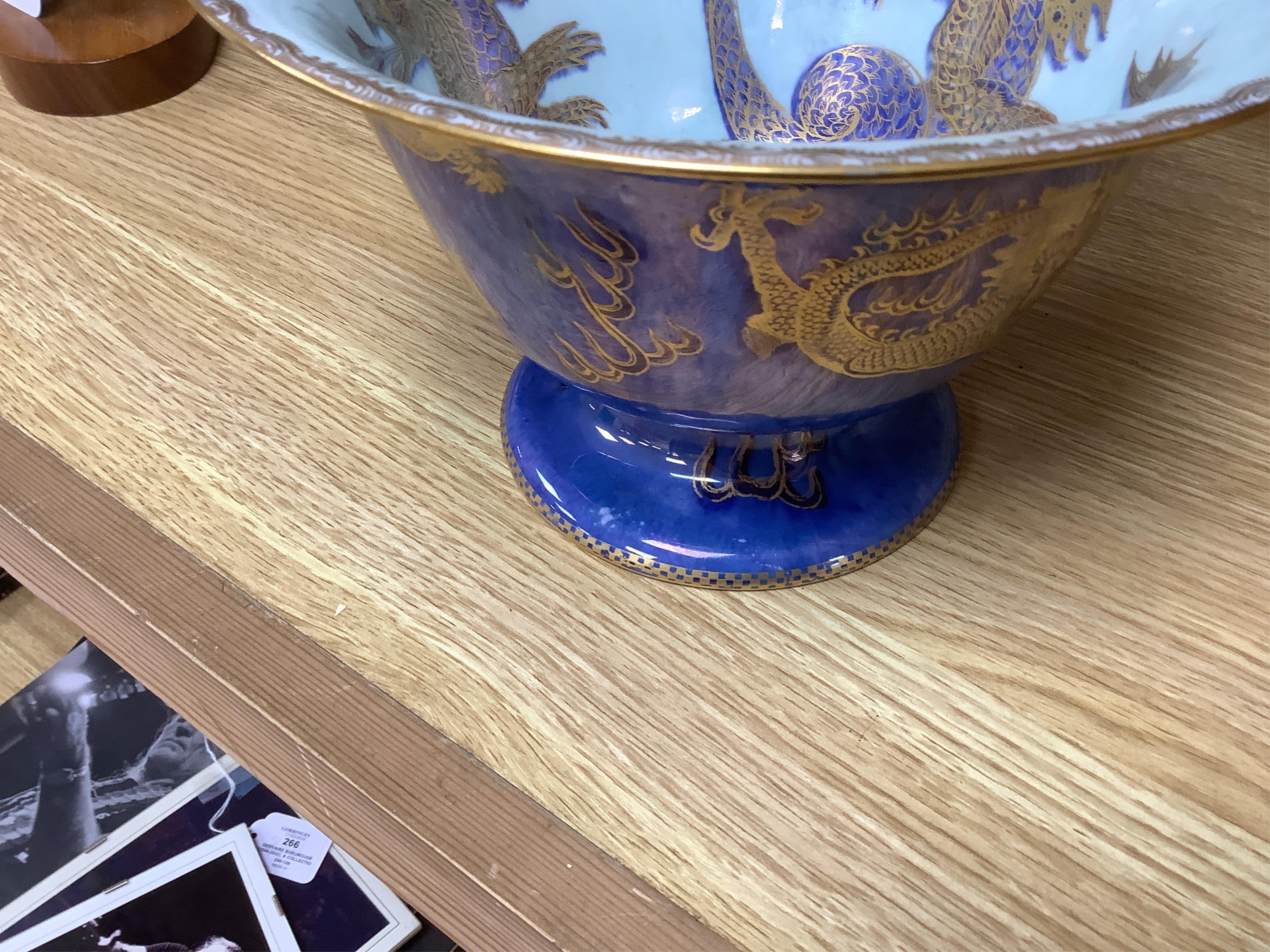 A Wedgwood lustre dragon bowl, numbered 4829 to the base, 22cm in diameter. Condition - good